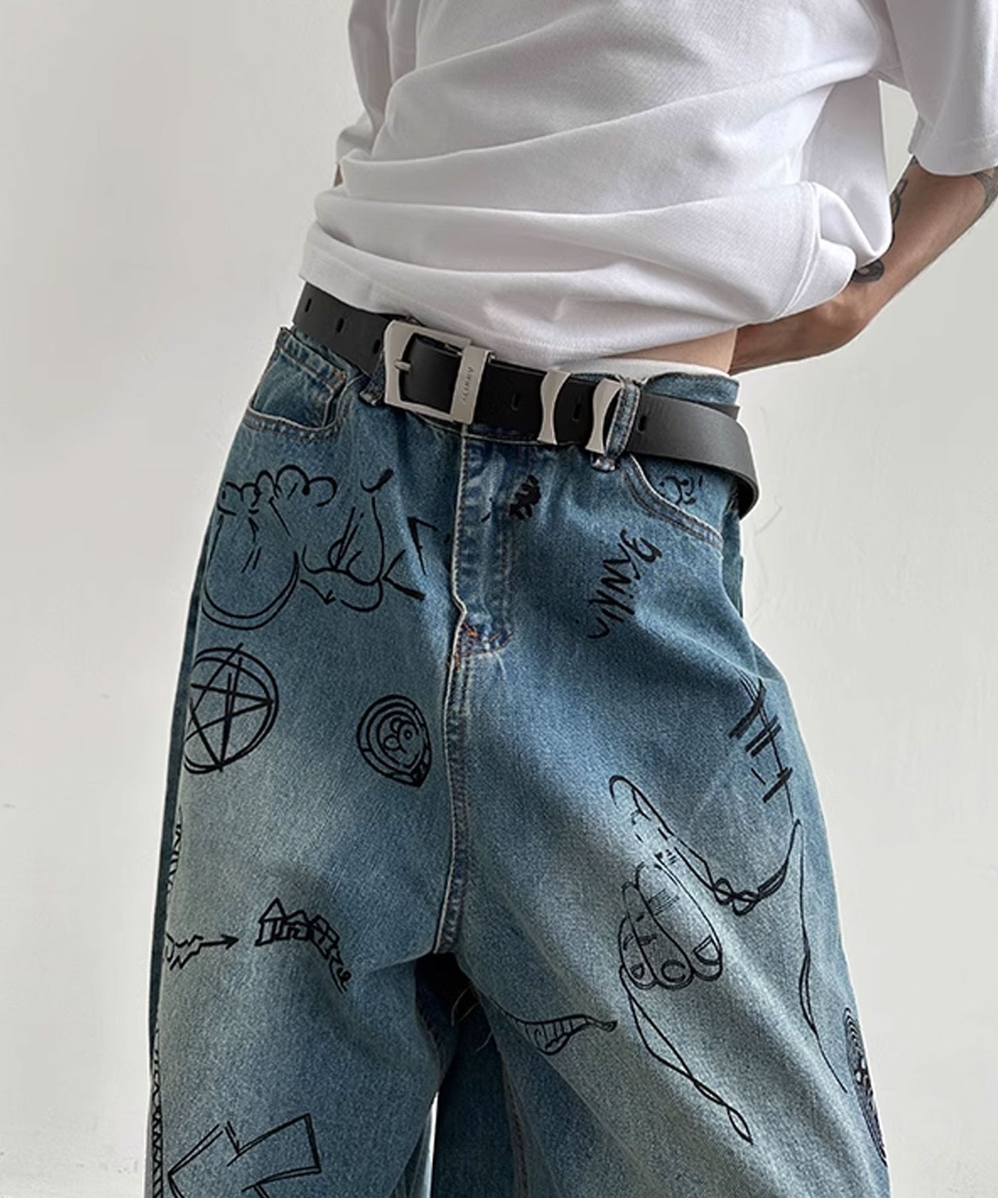 Theater code / illustration print wide denim pants