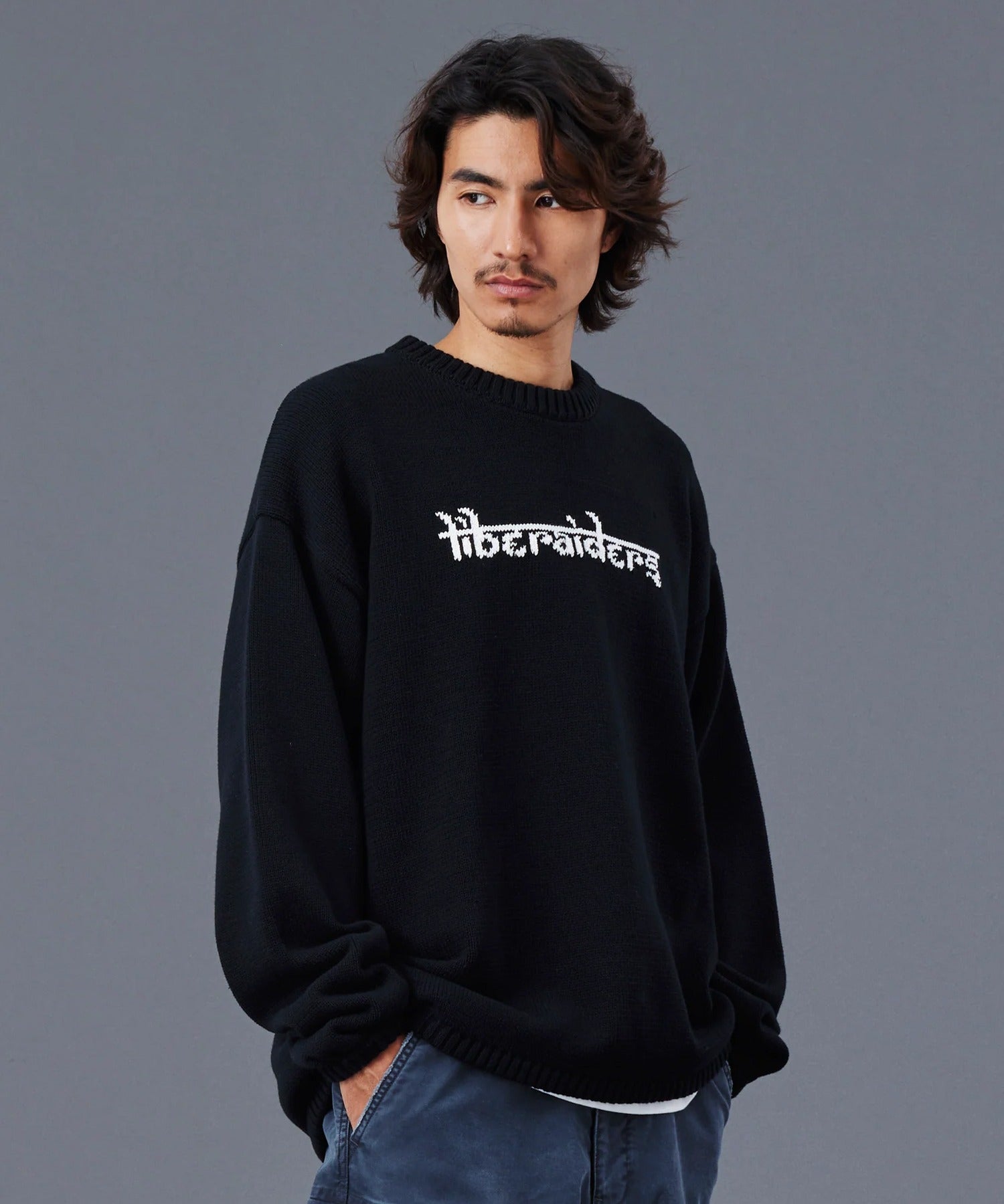 Liberaiders / WOVEN LOGO KNIT SWEATER