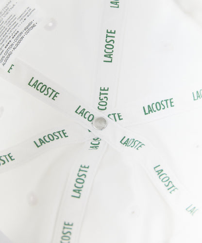 LACOSTE/ラコステ カーブバイザー 刺繍ワッペン コットン6パネルキャップ