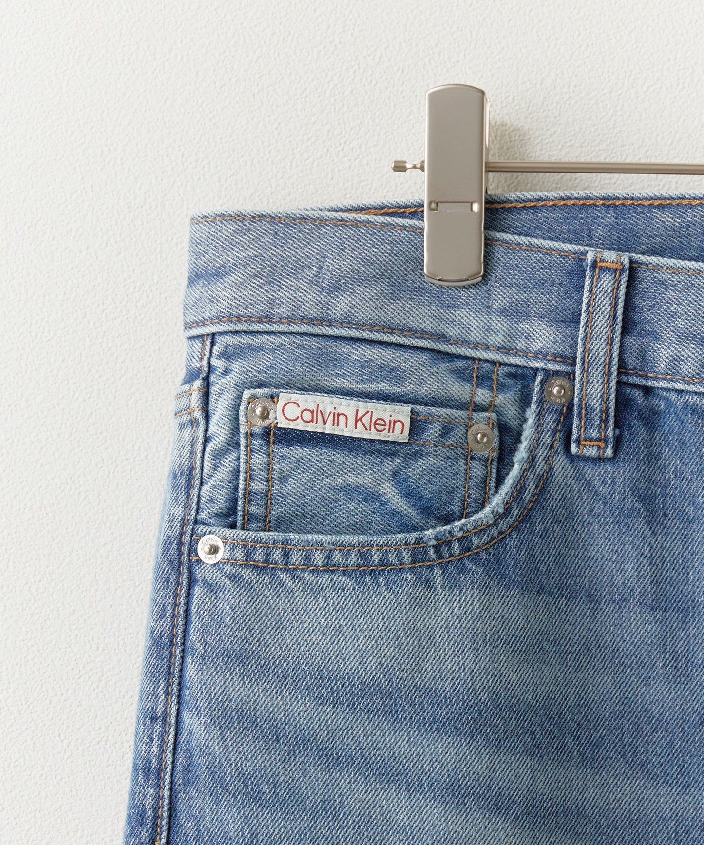 Calvin Klein / BAGGY HAPPER BLUE JEAN