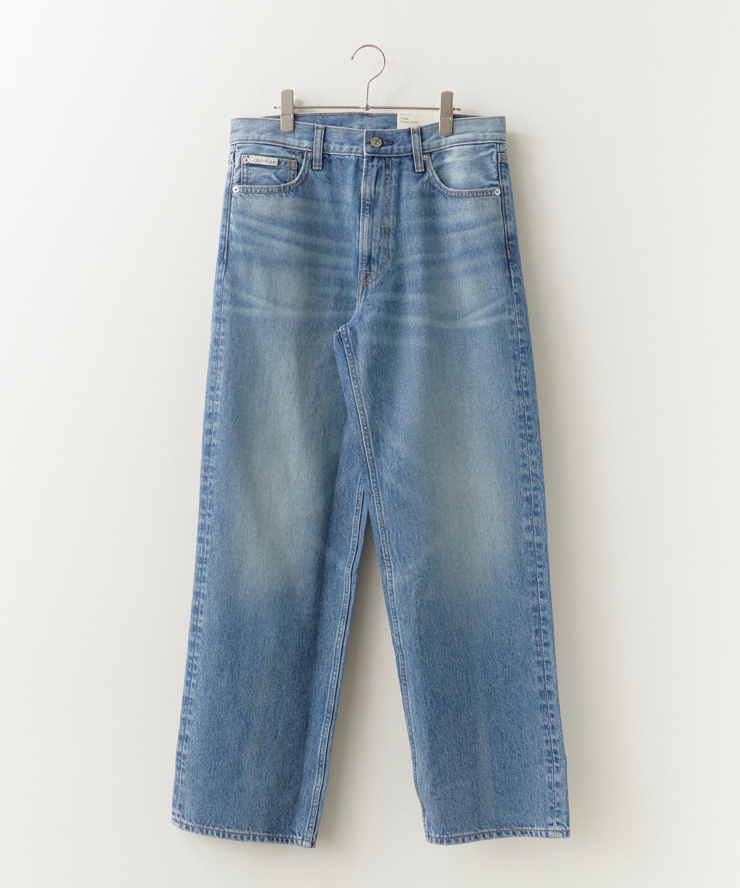 Calvin Klein / BAGGY HAPPER BLUE JEAN