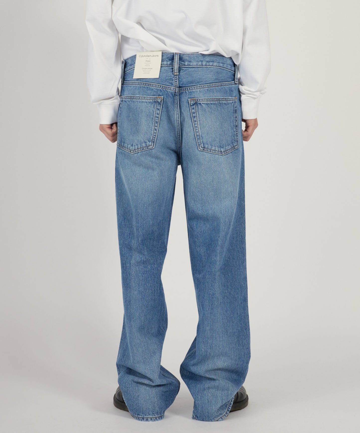 Calvin Klein / BAGGY HAPPER BLUE JEAN