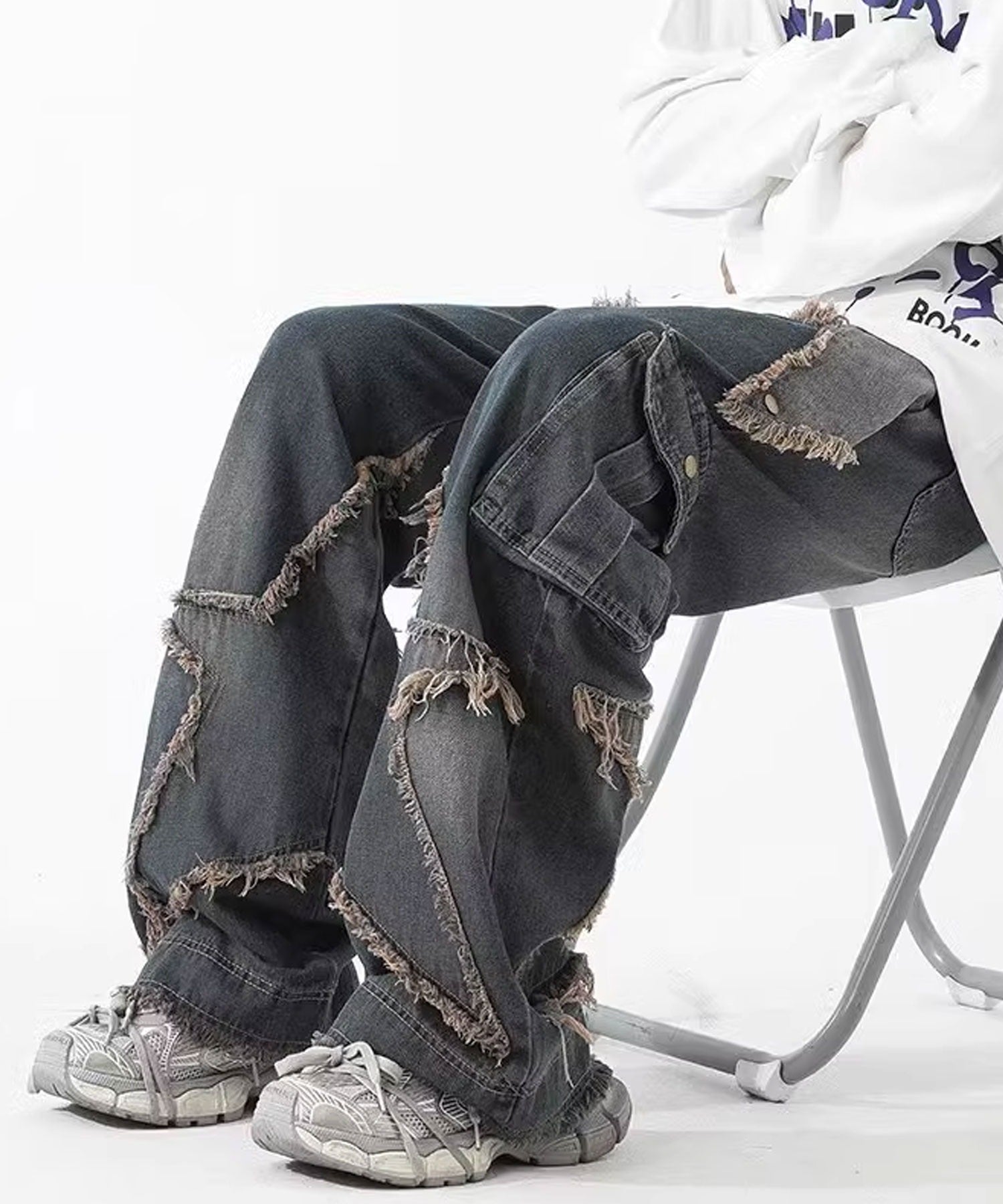 Theater code / star fringe denim pants