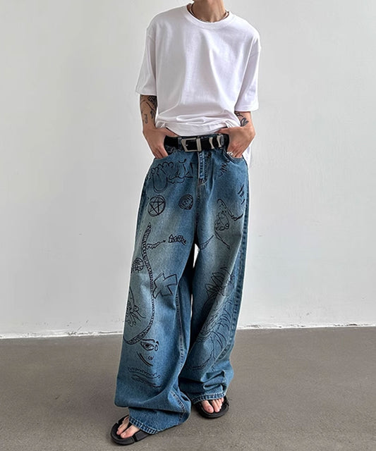 Theater code / illustration print wide denim pants