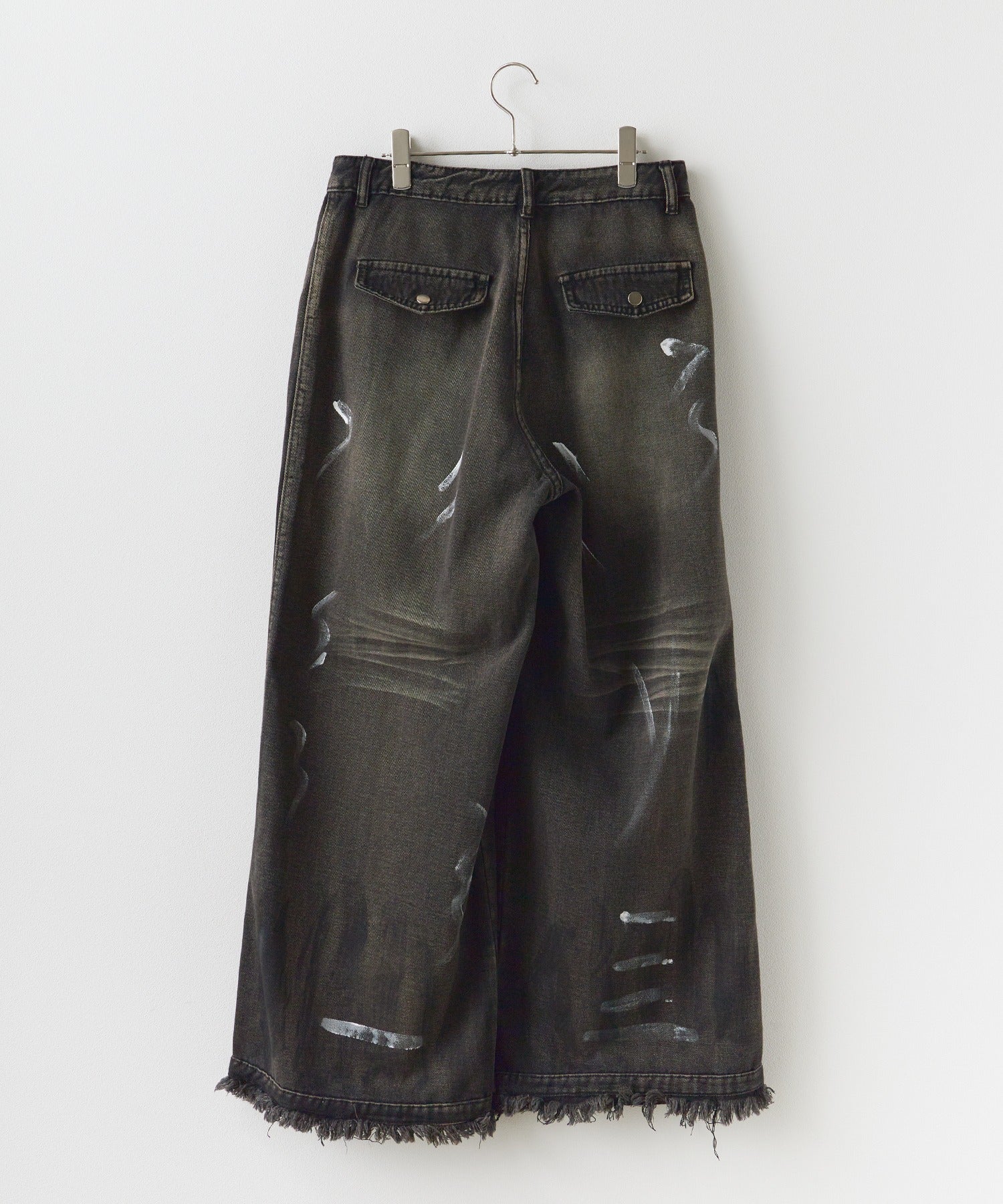 Theater code / irregular switching graffiti denim pants