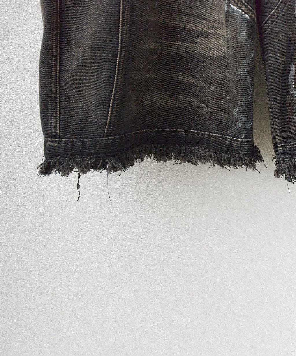 Theater code / irregular switching graffiti denim pants