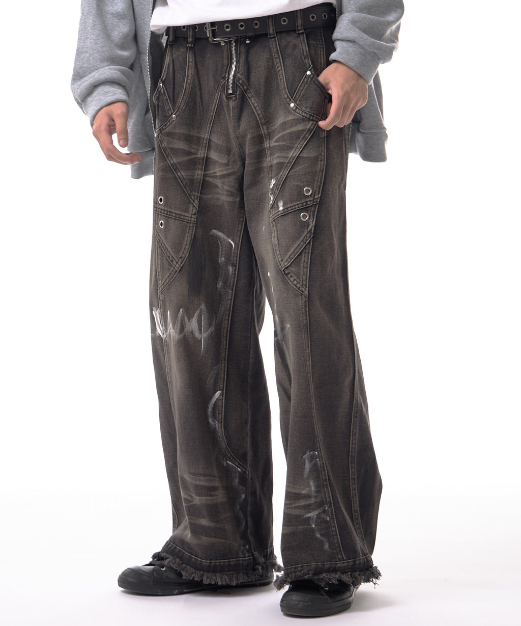 Theater code / irregular switching graffiti denim pants