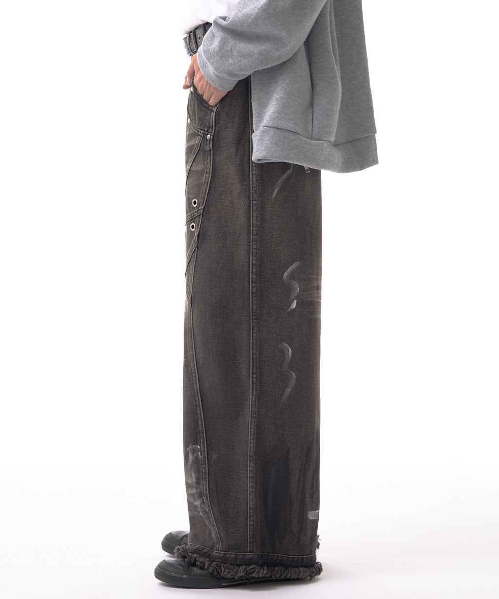 Theater code / irregular switching graffiti denim pants