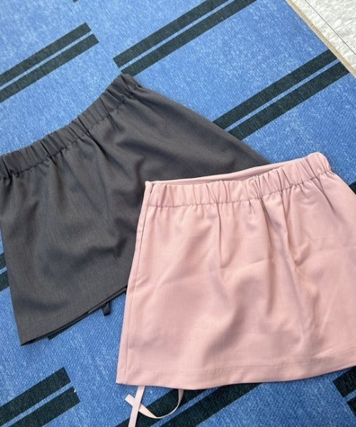 ipugo / Ribbon slit mini skirt