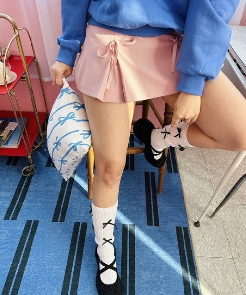 ipugo / Ribbon slit mini skirt