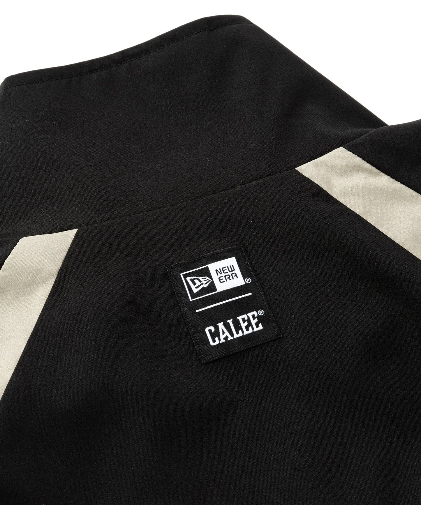 CALEE × NEW ERA / CALEE LOGO OVERSIZED PIPING TRACK JACKET