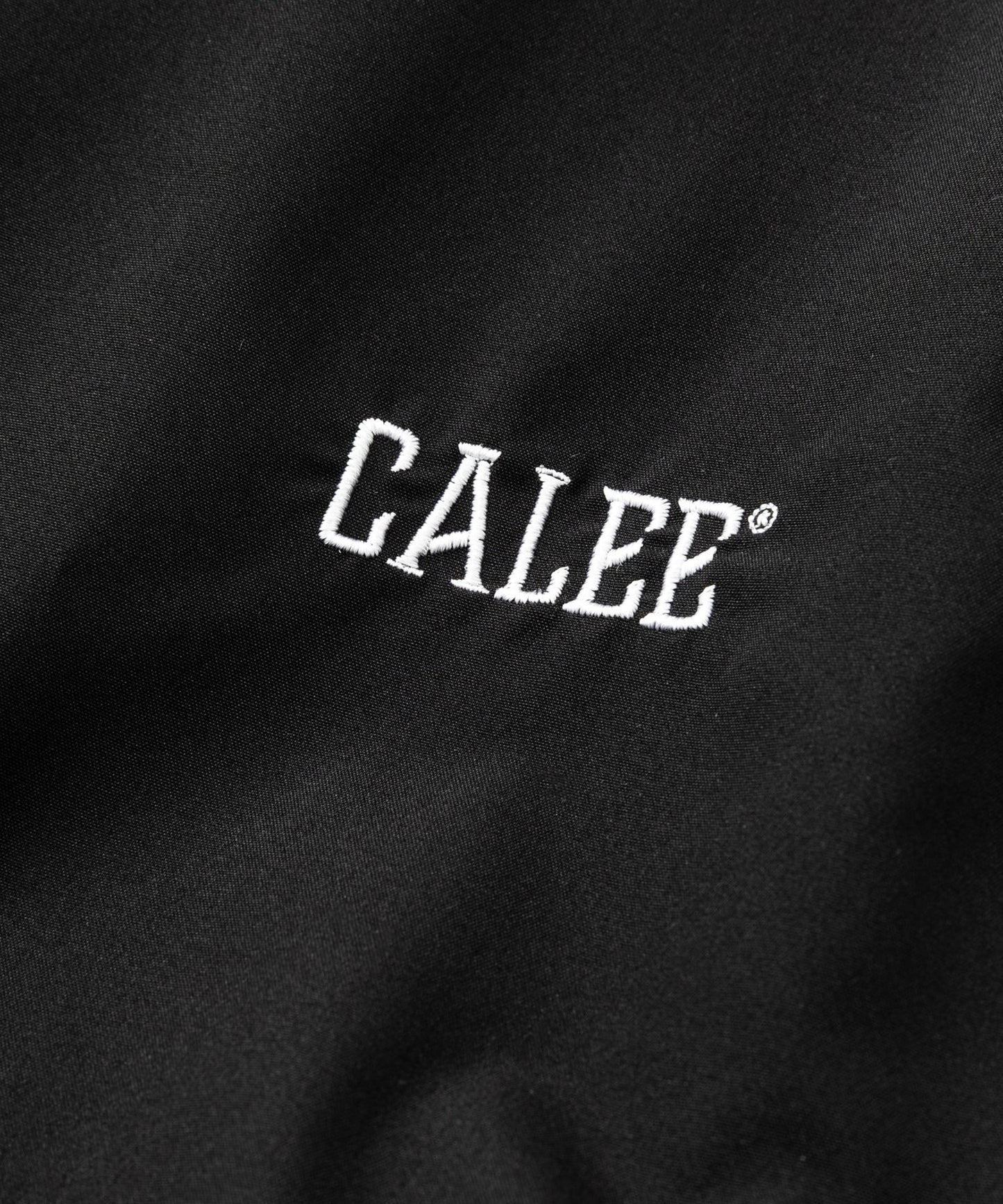 CALEE × NEW ERA / CALEE LOGO OVERSIZED PIPING TRACK JACKET