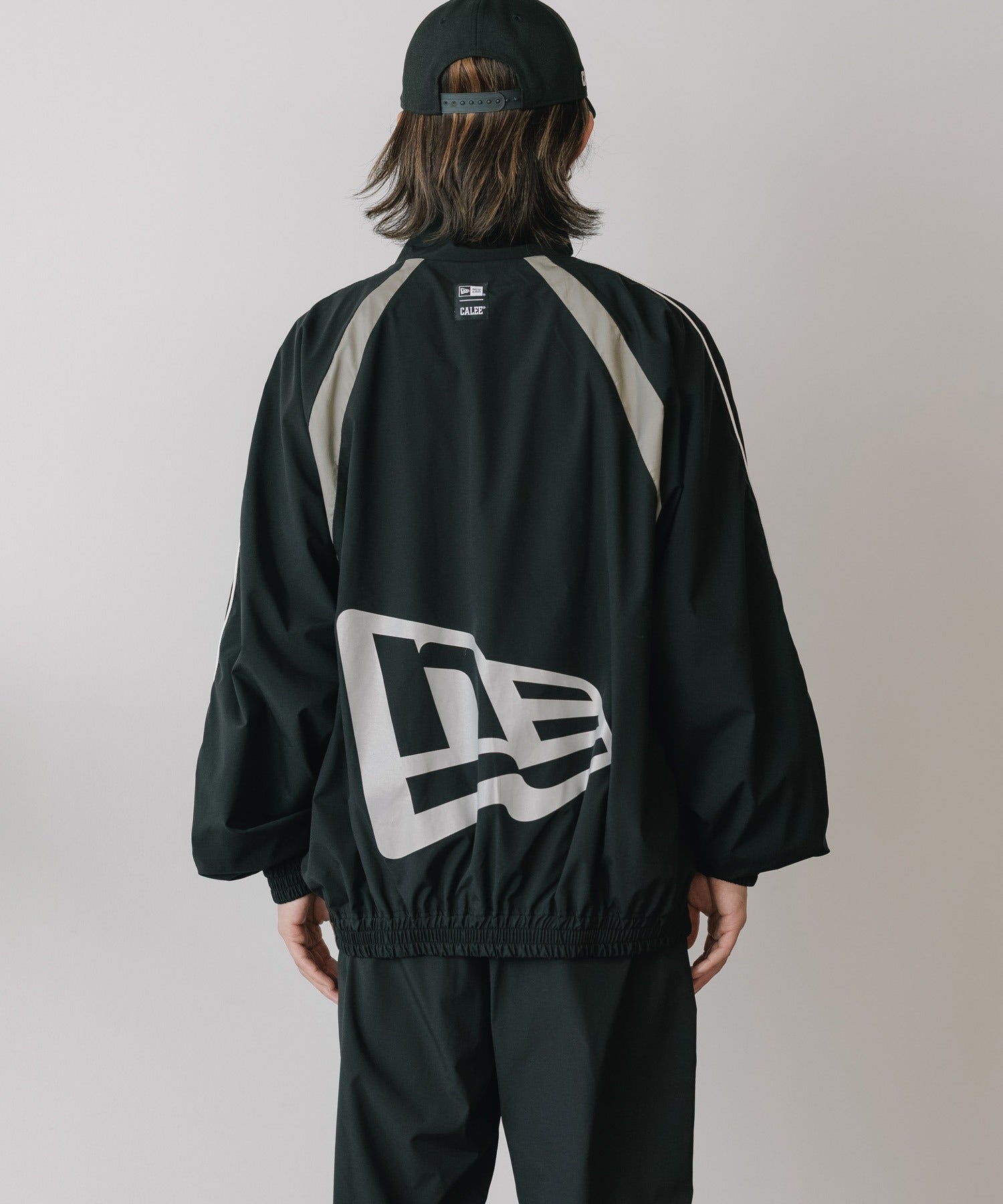 CALEE × NEW ERA / CALEE LOGO OVERSIZED PIPING TRACK JACKET