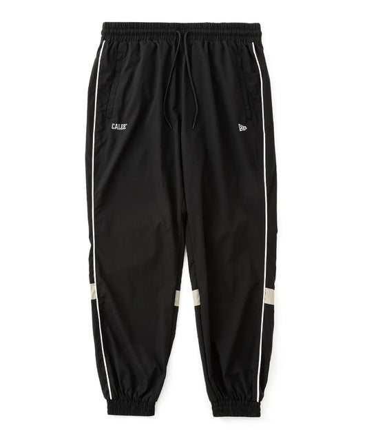 CALEE × NEW ERA/ CALEE LOGO OVERSIZED PIPING TRACK PANTS