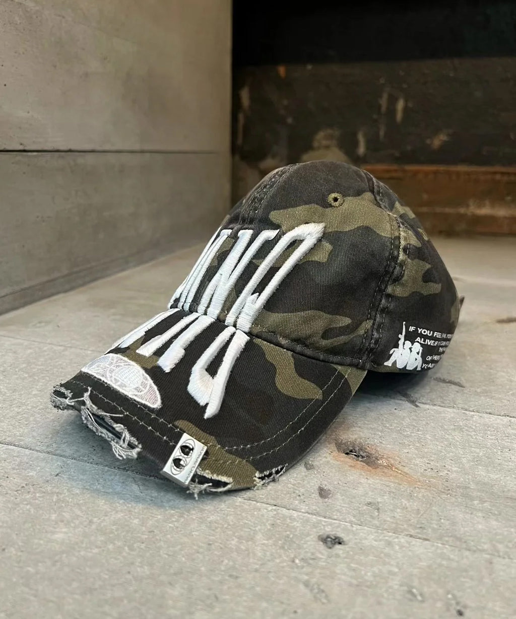 PANQ / 2024FW PIN-ATTACHED DESTORYED CAMO CAPS キャップ
