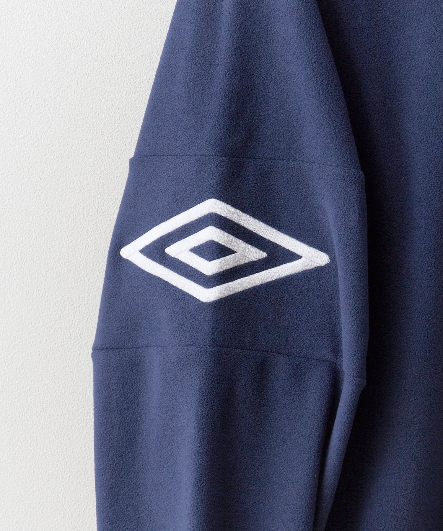 【予約】UMBRO / Half zip jacket フリース